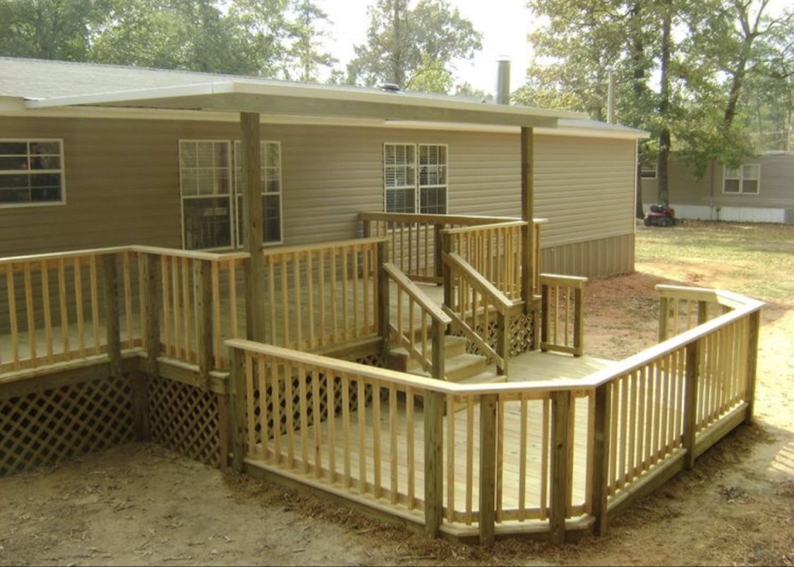 New wood deck with railings and covered porch