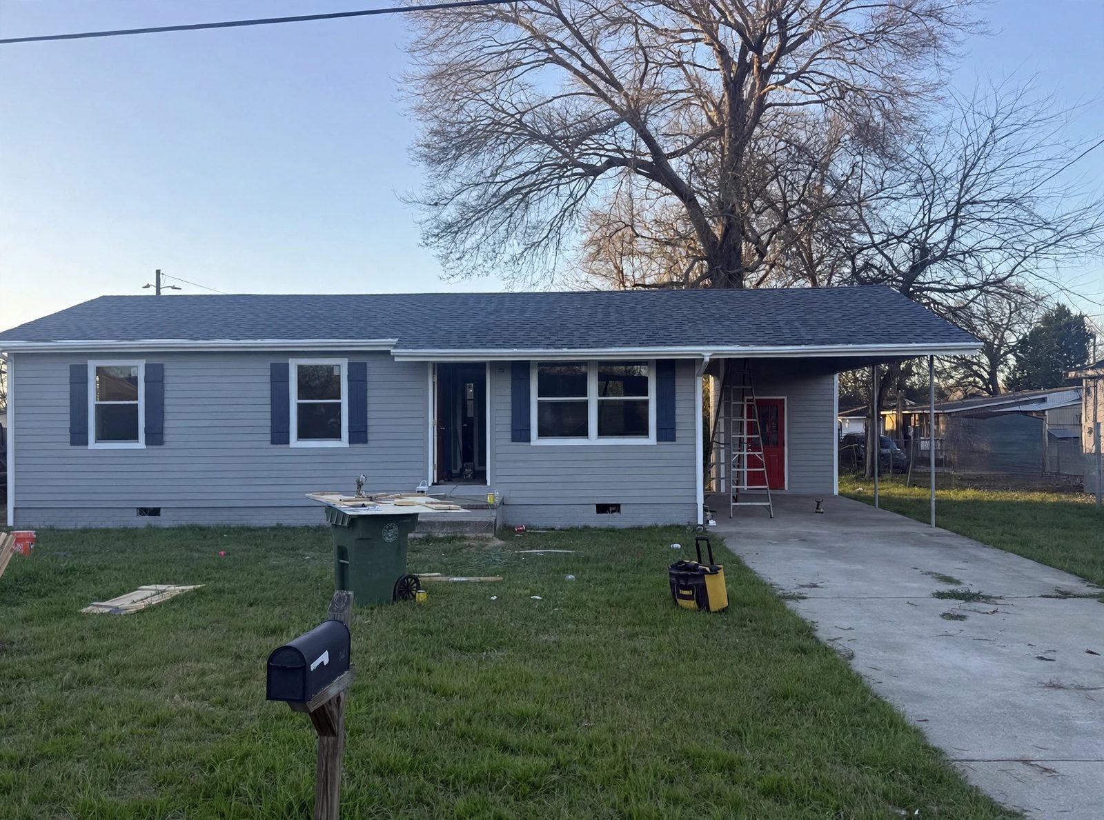Finished exterior with new architectural shingles and siding
