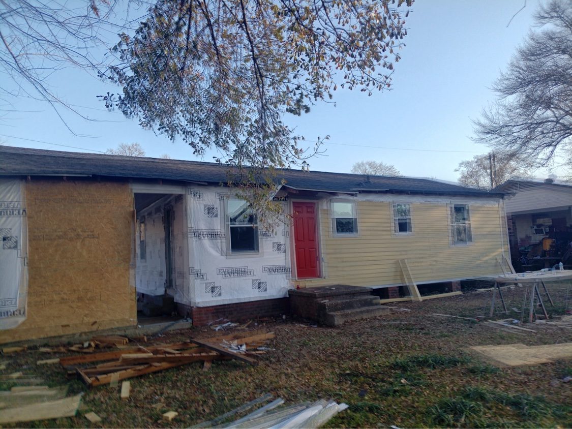 Siding and roof work in progress