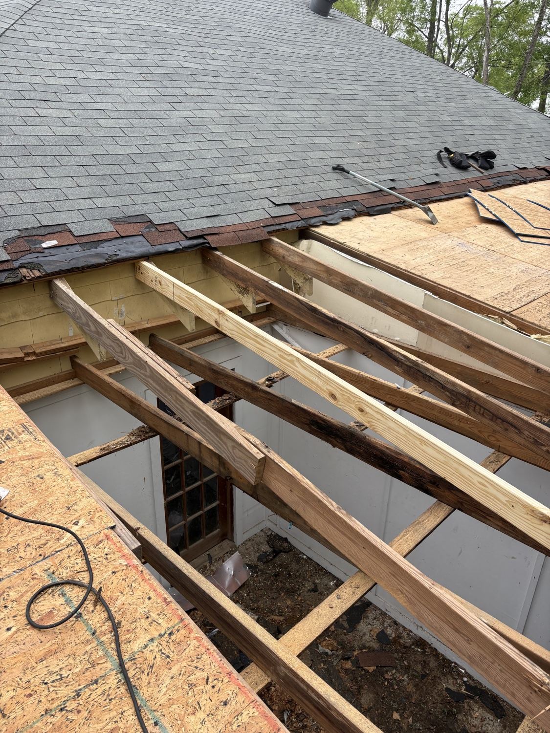 Rafter and framing repair found during tear-off